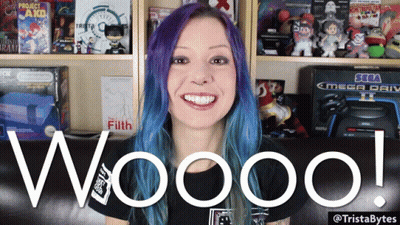 Woman With Purple Hair Saying Wooo In Front Of Sega Mega Drive GIF
