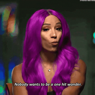 Woman With Purple Hair Says Nobody Wants To Be A One Hit Wonder GIF