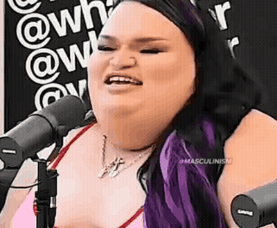 Woman With Purple Hair Smiling At Microphone GIF