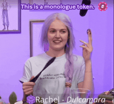 Woman With Purple Hair Wearing Healthcare Shirt GIF