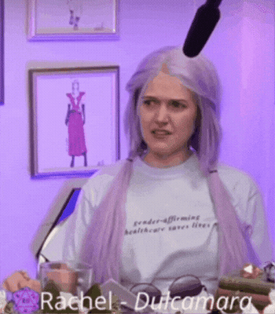 Woman With Purple Hair Wearing Rachel Shirt GIF