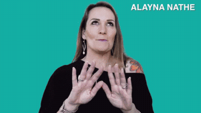 Woman With Rainbow Saying Magic GIF