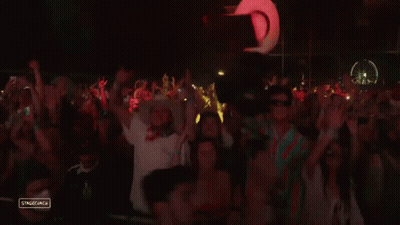 Woman With Rainbow Saying Magic GIF