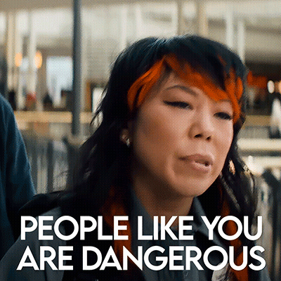 Woman With Red And Black Hair Says People Like You Are Dangerous GIF