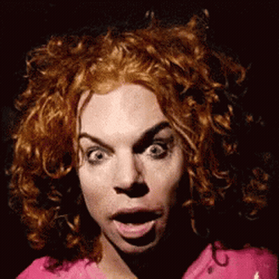 Woman With Red Curly Hair Surprised Saying Thanks GIF