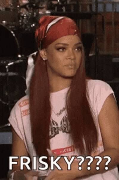 Woman With Red Hair And Bandana Saying Frisky GIF