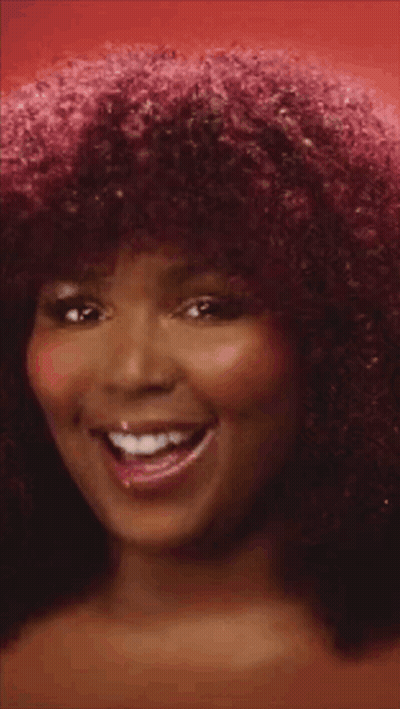 Woman With Red Hair And Big Afro GIF