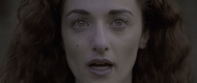 Woman With Red Hair And Blue Eyes Close Up GIF