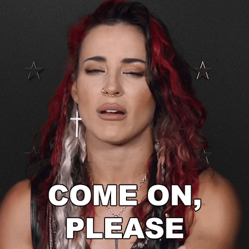 Woman With Red Hair And Cross Earrings Says Come On Please GIF