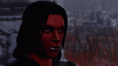 Woman With Red Hair And Eyes In Snow GIF