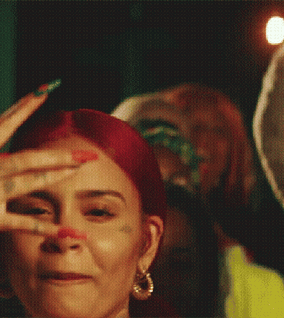 Woman With Red Hair And Face Tattoo GIF