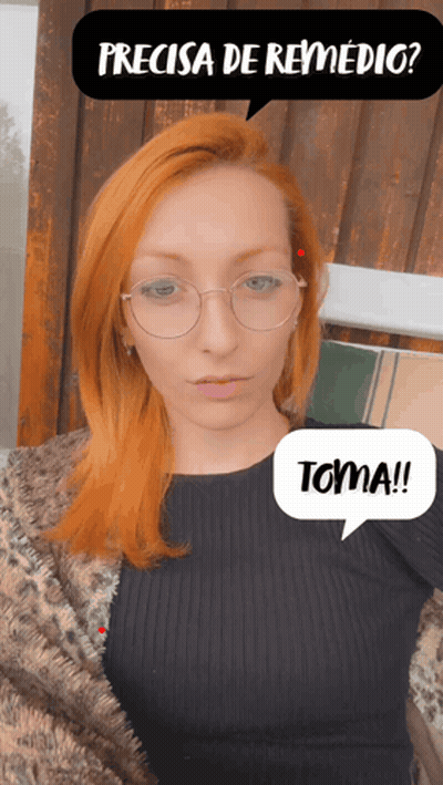 Woman With Red Hair And Glasses Saying Toma GIF
