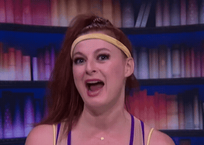 Woman With Red Hair And Headband Smiling GIF