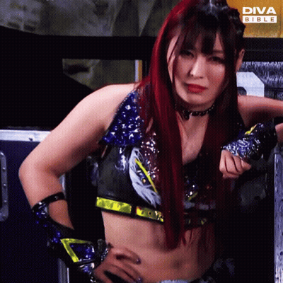 Woman With Red Hair At Diva Bible Banner GIF