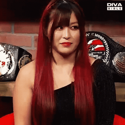 Woman With Red Hair At Diva Bible Belts GIF