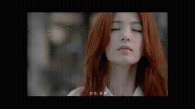 Woman With Red Hair Close Up GIF