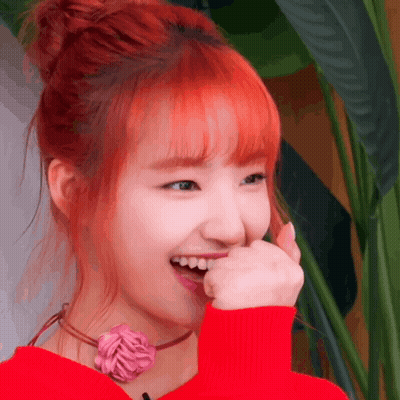 Woman With Red Hair Covering Mouth GIF