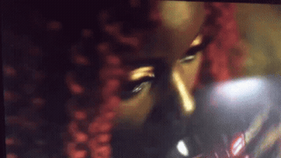 Woman With Red Hair Drinking From Glass GIF