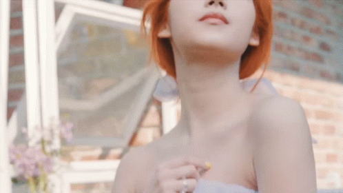 Woman With Red Hair Eyes Closed GIF