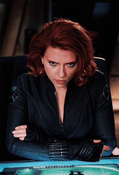 Woman With Red Hair In Black Jacket GIF