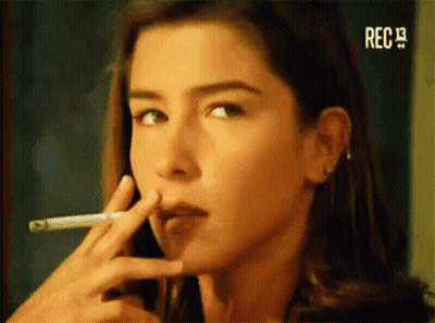 Woman With Red Hair In Front Of Blue Wall Saying Daylight Come & Me Wanna Go Home GIF
