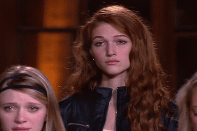 Woman With Red Hair In Leather Jacket GIF