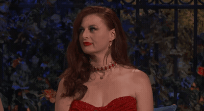 Woman With Red Hair In Red Dress GIF