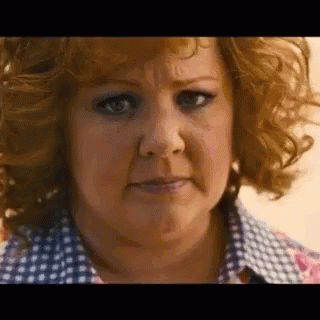 Woman With Red Hair Making Funny Face GIF