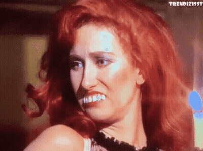 Woman With Red Hair Making Funny Face Trendizisst GIF