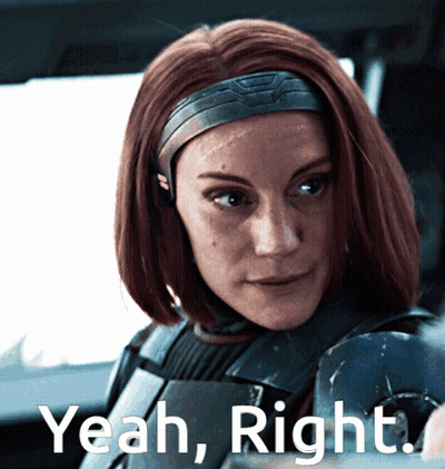 Woman With Red Hair Saying Yeah Right GIF