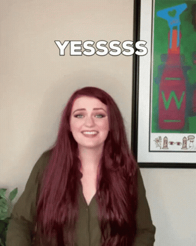 Woman With Red Hair Saying Yesssss GIF