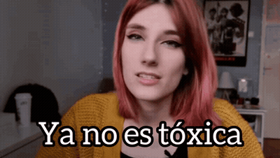 Woman With Red Hair Says Ya No Es Toxica In Yellow Sweater GIF
