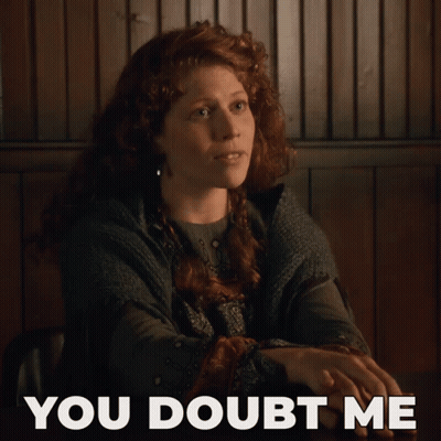 Woman With Red Hair Sitting You Doubt Me GIF