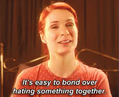 Woman With Red Hair Smiling Says Its Easy To Bond Over Hating Something Together GIF