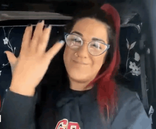 Woman With Red Hair Waving GIF
