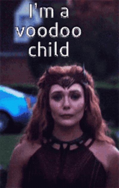 Woman With Red Hair Wearing Crown Says Voodoo Child GIF