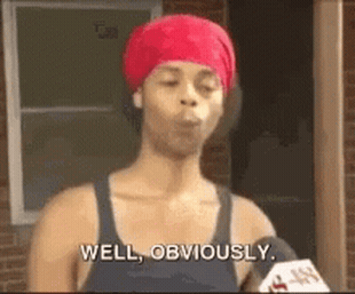 Woman With Red Headband Talking Into Microphone GIF