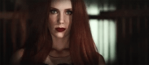 Woman With Red Lips And Blue Tank Top GIF