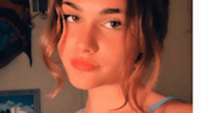 Woman With Red Lips And Blue Tank Top GIF