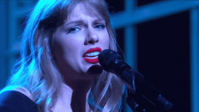 Woman With Red Lips Singing Into Microphone GIF
