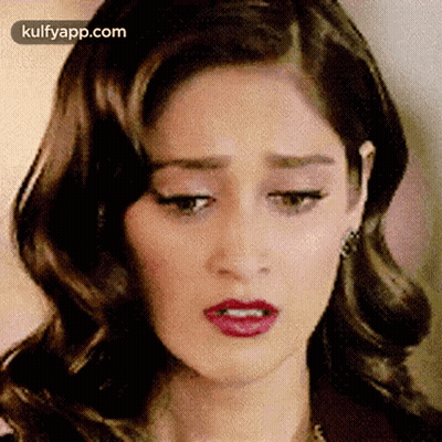Woman With Red Lipstick And Earrings GIF
