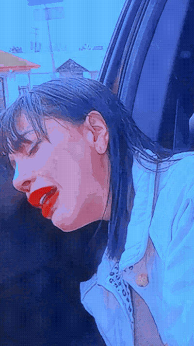 Woman With Red Lipstick Head Out Car Window GIF