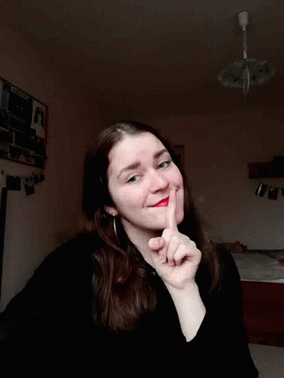 Woman With Red Lipstick Smiling Making Funny Face GIF