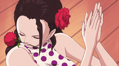 Woman With Red Rose In Hair Holding Hands GIF
