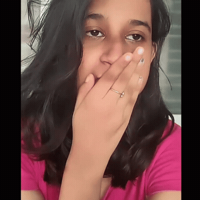 Woman With Ring Covering Mouth GIF