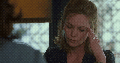 Woman With Ring Holding Head GIF