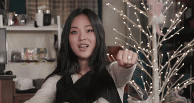 Woman With Ring Pointing At Camera GIF