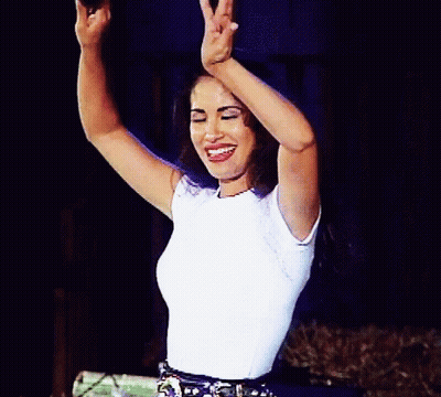 Woman With Ring Smiling And Waving GIF
