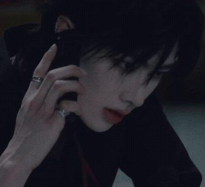Woman With Ring Talking On Cell Phone GIF
