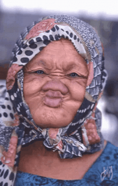 Woman With Scarf Making Face GIF